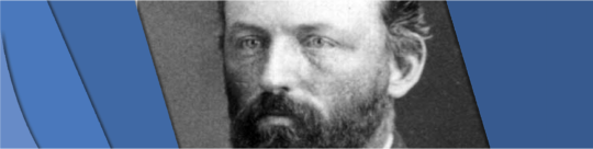Schultz shown with a beard in a black and white photo
