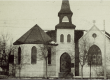 Photo of Knox Presbyterian Church. Made with bricks and high peaking A-Frame roofs.
