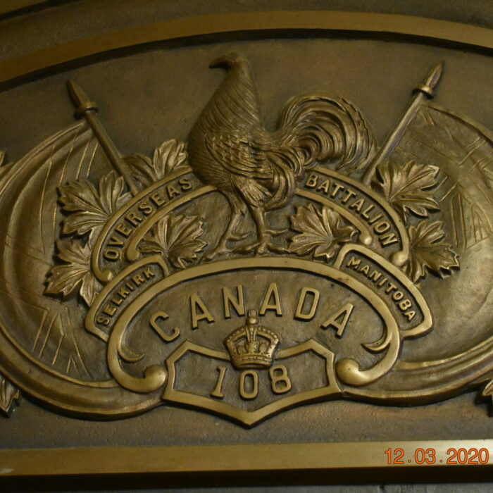 A colour of a bronze tablet with the 108th Ensignia design on it