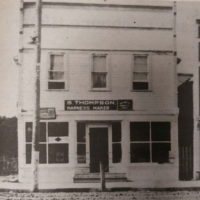 232 Manitoba Ave, Thompson & Lovtiz Tailors, c1930, Selkirk Enterprise Centennial 1982 Black and white photo of Thompson store