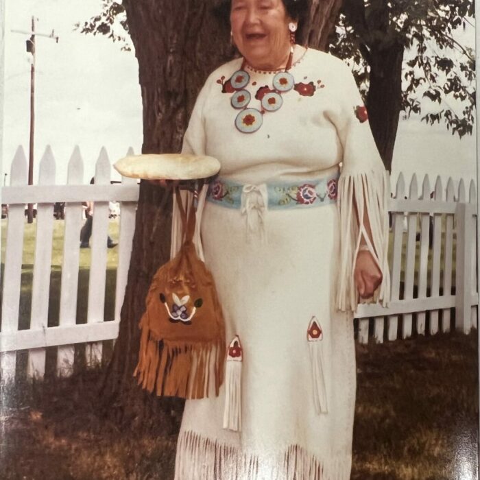 Photo of Amy Clemons in a white dress
