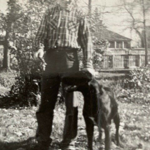 Bish and Zorro, 1961, Mary Shumilak A child standing next to a dog outside