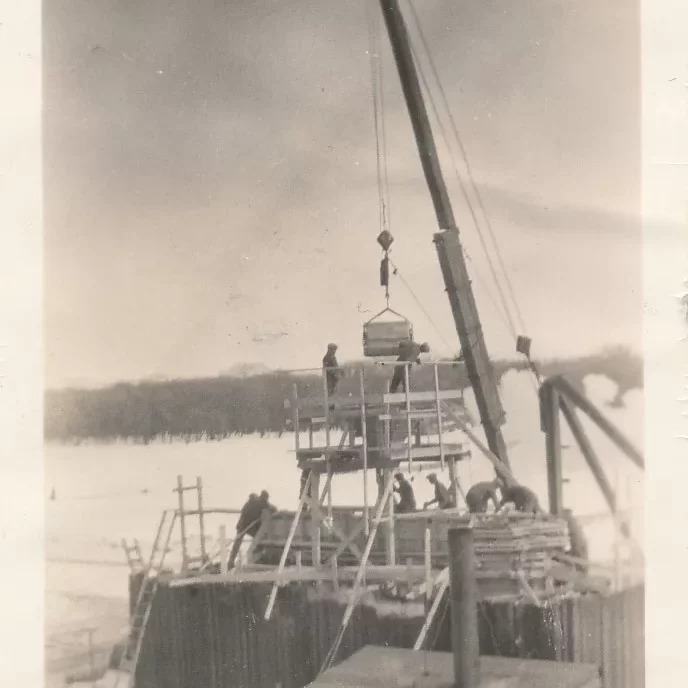 Crane Building Selkirk Bridge, 1935, Fraser Stewart Black and white picture of a crane building the Selkirk bridge