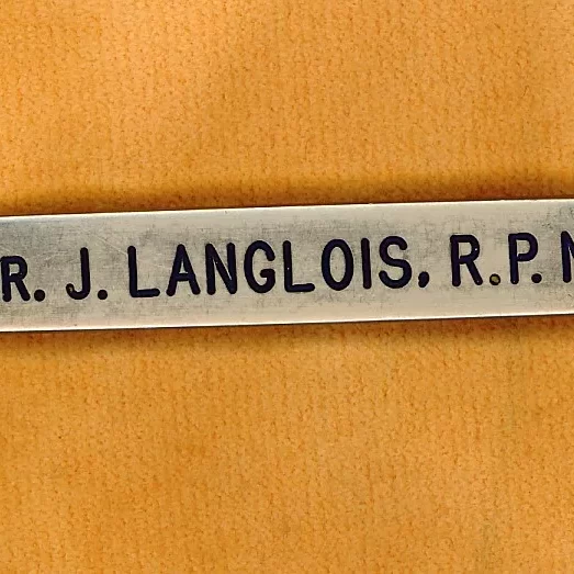Dad Jock Langlois's Pin from Working at the Selkirk Mental Hospital, Date Unknown, Jock Langlois Name tag for Jock Langois