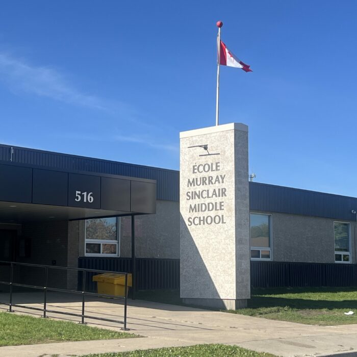 École Murray Sinclair Middle School, 2026, Selkirk Museum Collection Photo of the front entrance to the middle school, the sign says Ecole Murray Sinclair Middle School.