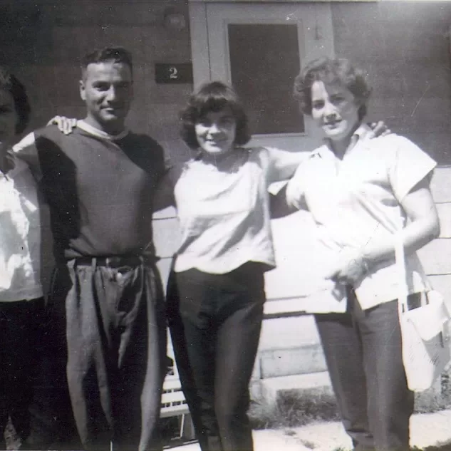 Ernie and the Langlois Sisters, Date Unknown, Jock Langlois Black and white portrait of four Langois siblings in front of a home