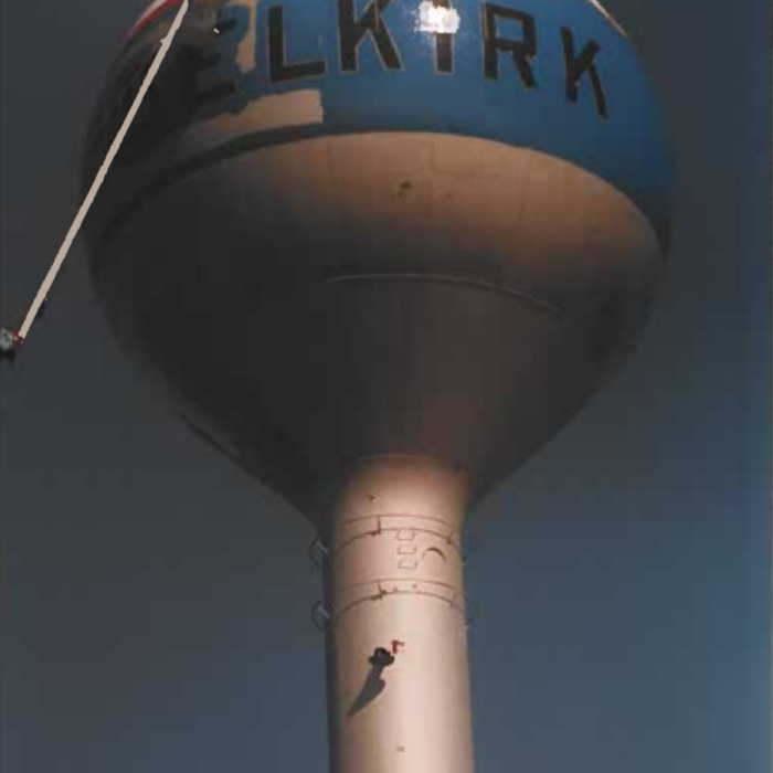 Colour photo of the water tower being painted