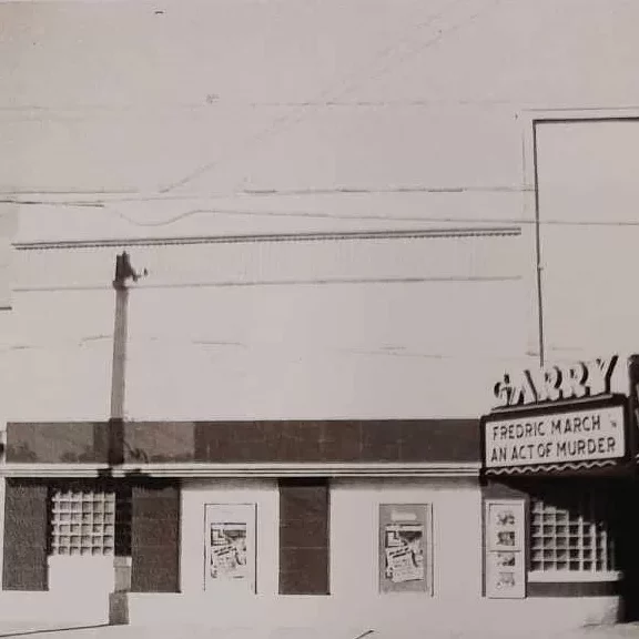 Black and white front view of the Garry Theatre in 1949