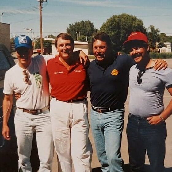 Four men posing for a snap