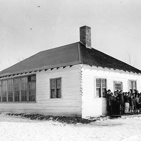 Black and white image of a small rectangular building