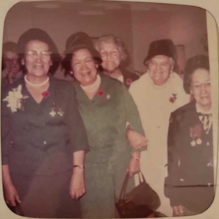 Photo of Amy Clemons with a group of women