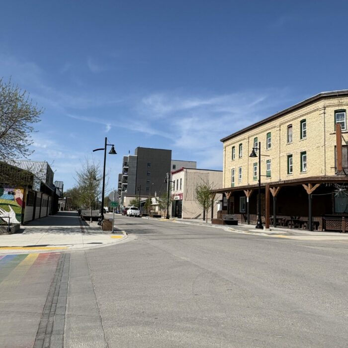 Colour photo of a street view with view of the Merchant's Hotel on the right hand side