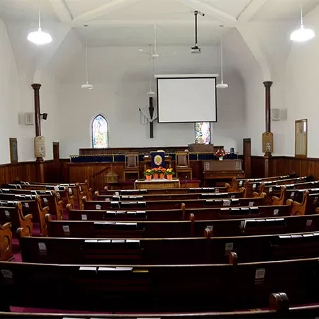 Inside of the knox church showing the pews