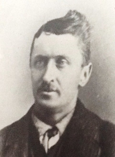 Headshot of a mature James Colcleugh