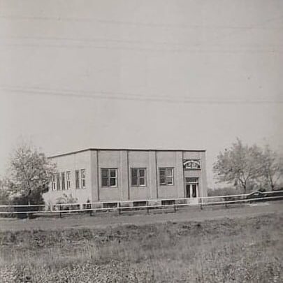 Black and white outdoor view of the Rolling Mills office