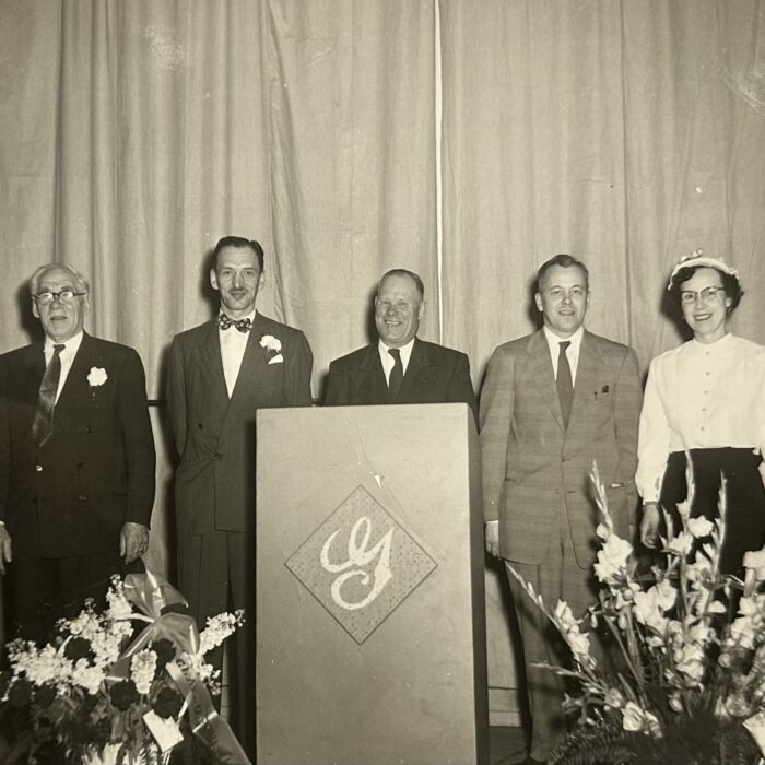 Garry Theatre opening night, group of people dressed nicely for the event at a podium