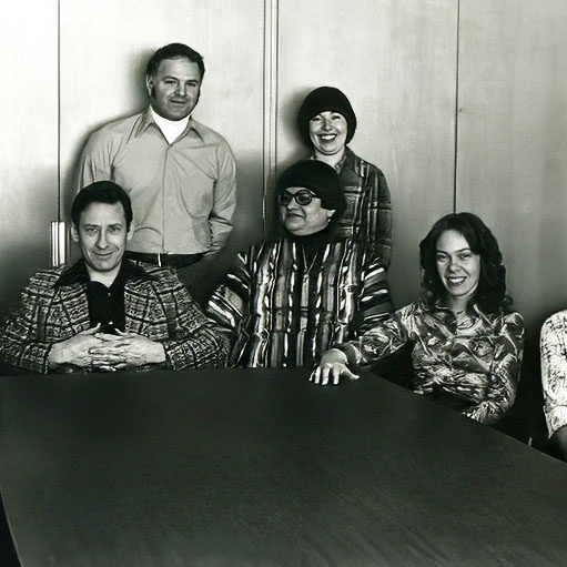 Podruchny with LSRCSS Staff, 1972, Thomas Podruchny Black and white image of a group of adults standing and sitting against a wall
