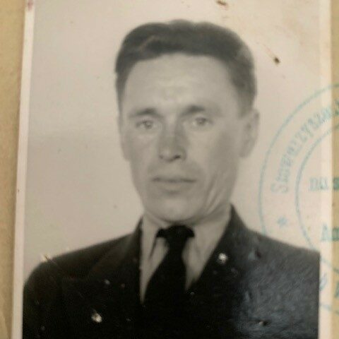 Poitr (Peter) Grabowski Passport Photo, Date Unknown, Mary Shumilak Man in a suit and tie looking with neutral expression towards the camera