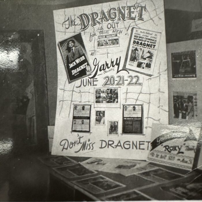 A black and white photo of a movie poster advertising for the the movie 'Dragnet'