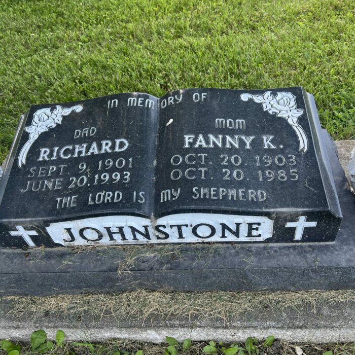 Richard Johnstone Gravestone, 2026, Selkirk Museum Collection Colour photo of a gravestone in the shape of a book. The front of the stone reads 'Johnstone'
