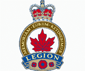 This is a photo of the Royal Canadian Legion Badge. It has a Gold circle with the words Memorial, Eorum, and Retinebimus written across it it. There is a Red and grey crown placed on top, with a blue ribbon with the word "Legion" written across the front, and three red poppies underneath.
