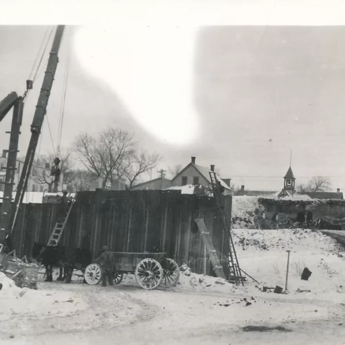 Selkirk Bridge and Bell Tower of Selkirk Town & Firehall in Background, c1935, Alf Barnett Black and white sunlight damaged photo of the Selkirk bridge and bell tower