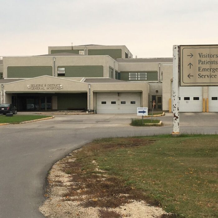 Selkirk & District General Hospital, circa 2017, News4 Large grey and white building at the end of a curving driveway