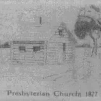 Photo of small log cabin before present Knox church was built