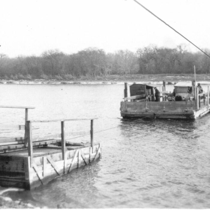 Selkirk Ferry, 1923, Red River North Heritage Ferry boat leaving or approaching dock at rivers edge