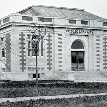 Selkirk Public Library, 1913, Archives of Manitoba Photo of the Selkirk Public library. Large brick building with downs on all sides of the building. Large door in the front invite people in.