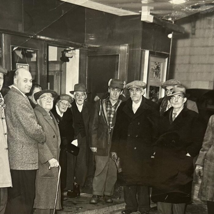 A black and white photo of a group of people