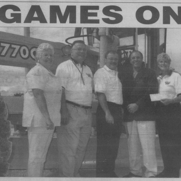 Newspaper article with text "Games On"