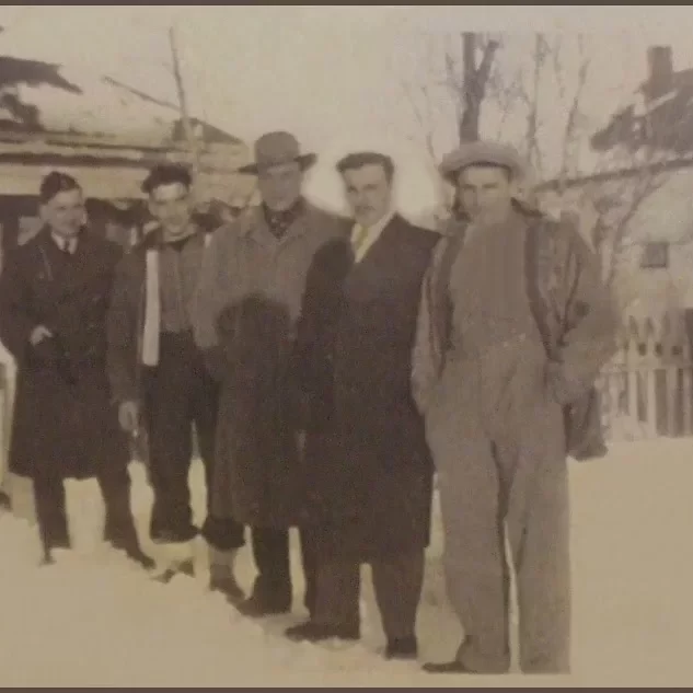 Ted, Herbie, Cyril, Jock, Carl, 1947, Jock Langlois Black and white portrait of five Langois men in a line in front of a home