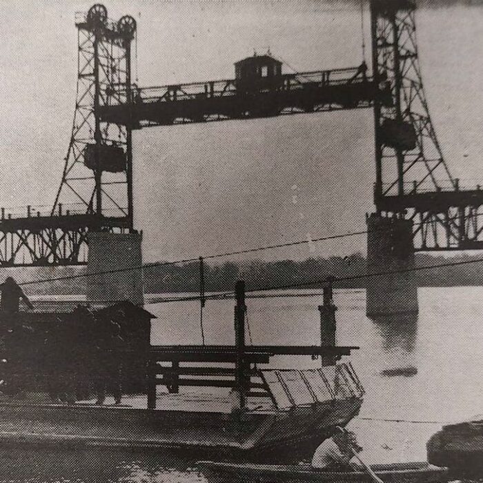 The Old and The New Selkirk Bridge Before it Opened and the Ferry, 1937, Selkirk Enterprise Centennial Edition Selkirk Bridge in the background with view of the Selkirk Ferry in the center of the image