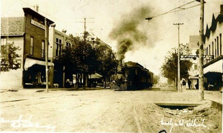 Image of a train travelling down Eveline street in Selkirk in 1906.