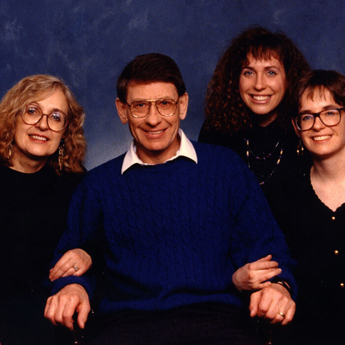 Thomas Sonia Heather and Carolyn Podruchny, 1991, Thomas Podruchny Studio portrait photograph of Tom Podruchny and his family. Four adults seated against a dark navy blue background