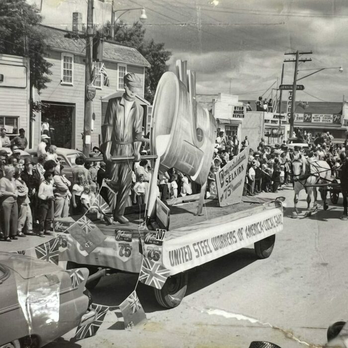 United Steel Workers, 1957, Selkirk Museum Collection United Steel Workers float being pulled in the parade by a car
