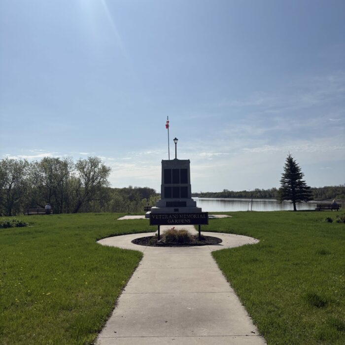 Colour photo of the veterans memorial park cenotaph from a distance