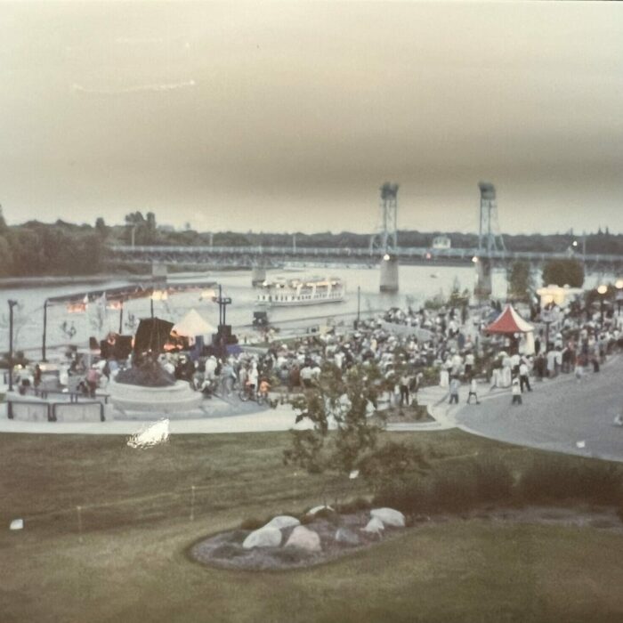 Color photo of the water front during a concert