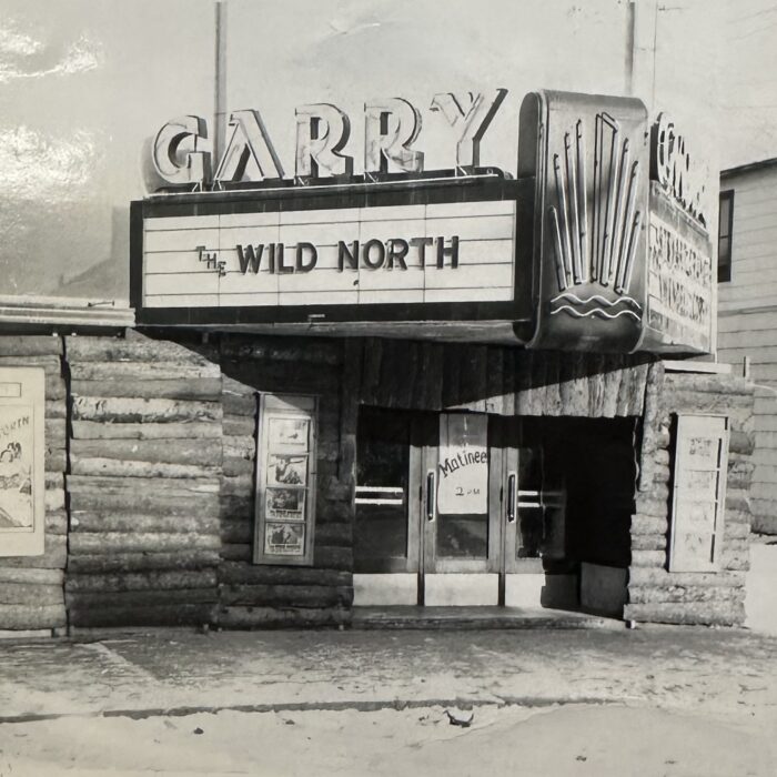 A black and white photo of the entrance to the Garry Theatre
