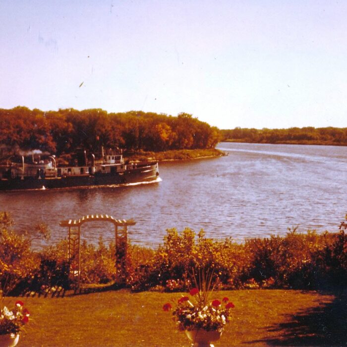 Yard with Bradbury seen in background, date unknown, Roy Gilbart Photo of the Bradbury from a back yard