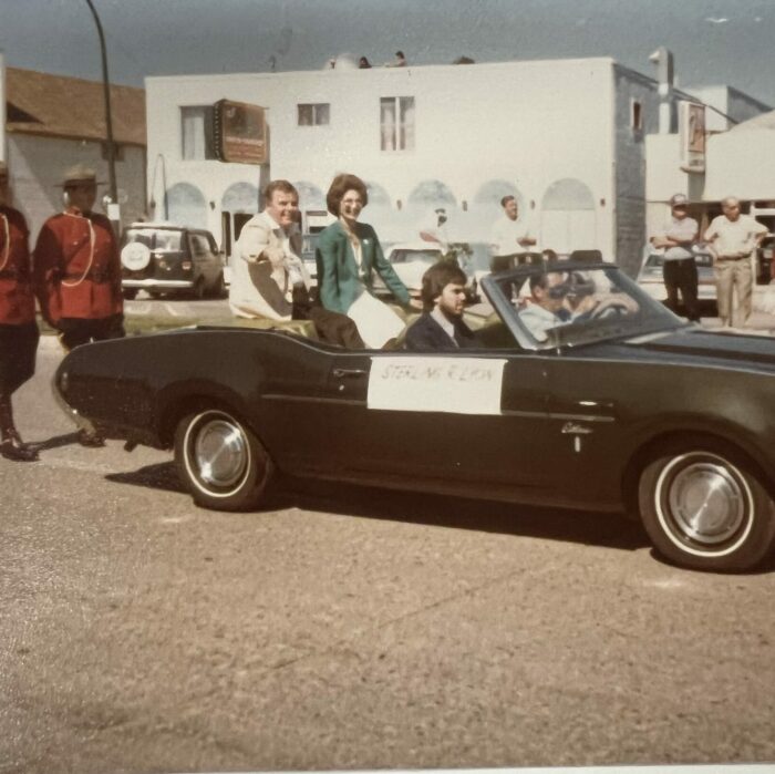 People in a Car at the Parade, Date Unknown, Selkirk Museum Collection colour photo of people in a black car in the parade