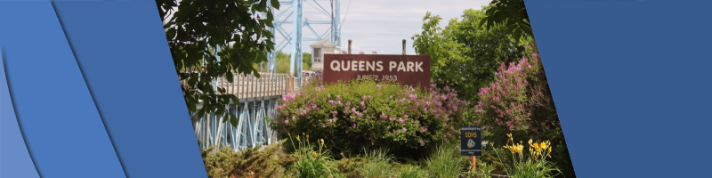 Queens Park Banner Queens Park sign in front of Selkirk's iconic blue bridge.
