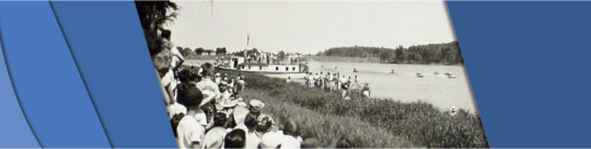 The Selkirk Park banner showing people on the shoreline of Selkirk Park watching boats pass by on the water