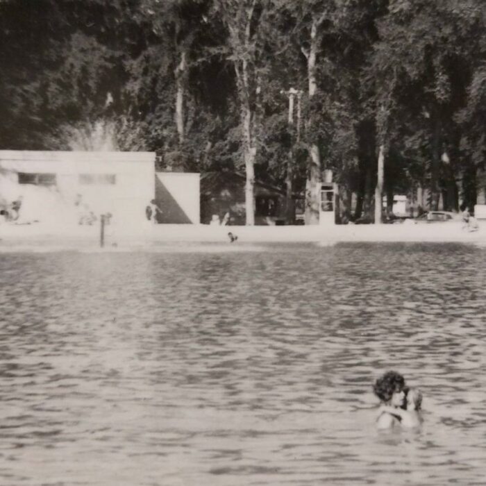 Selkirk Rotary Lake Woman and Child, Date Unknown, Selkirk Museum Collection Black and white photogrpah of a woman holding a child in her arms.