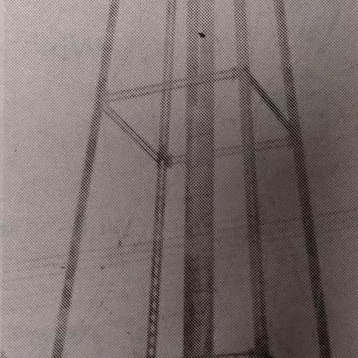 Black and white grainy image of the old water tower