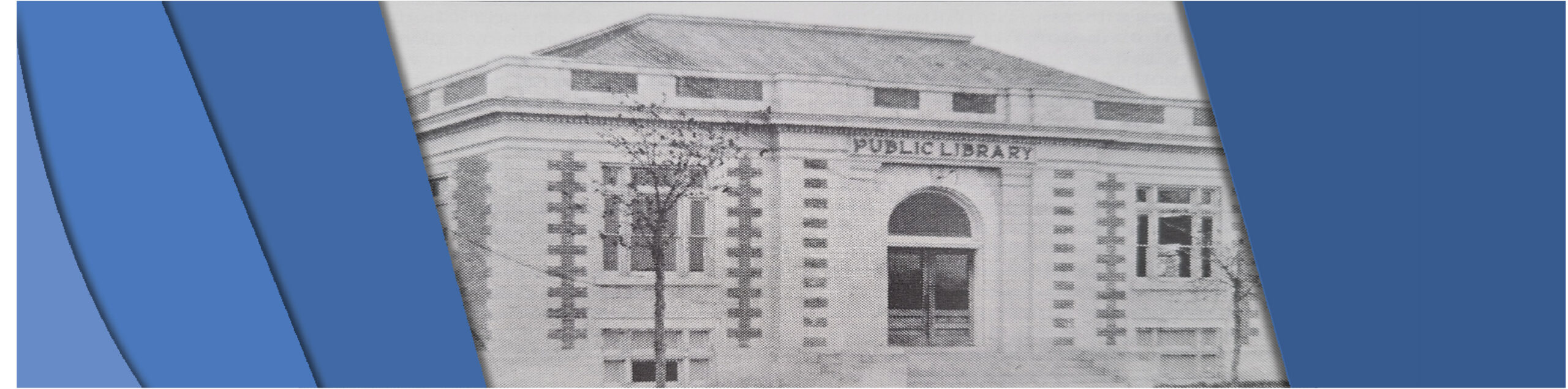 Picture of the front entrance to the original Selkirk Public Library. Large arched entrance with two large windows on either side.