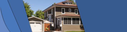 Photo of 213 Dorchester Avenue. The photo shows the two level home with a large front porch that doubles as a sunroom. The second floor has depicts two windows on the two visible sides of the hosue.