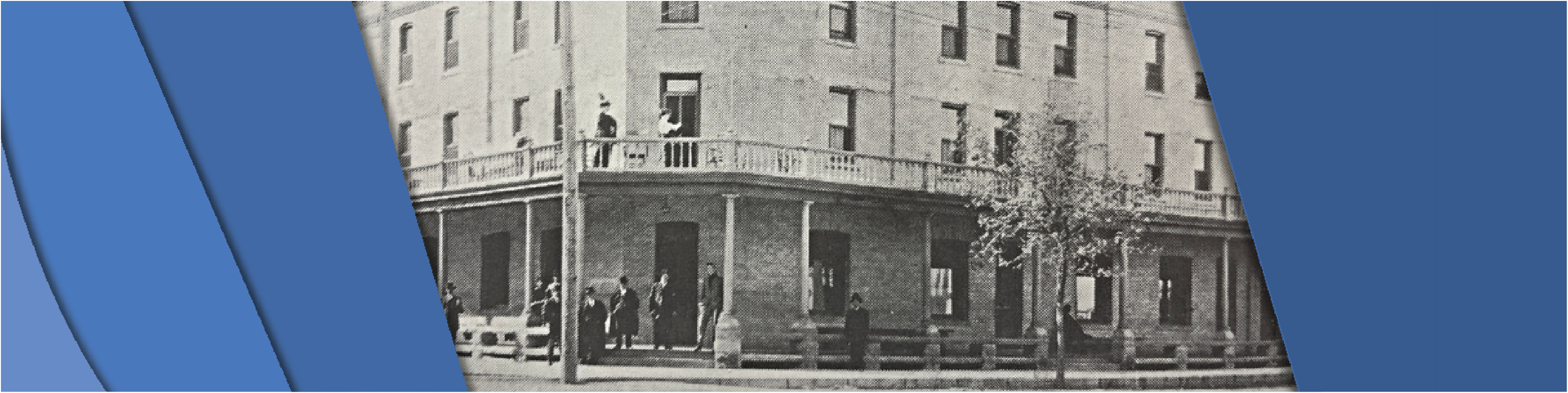 Photo that captures the front and sides of the Merchant's Hotel. This photo shows the buildings multiple levels.