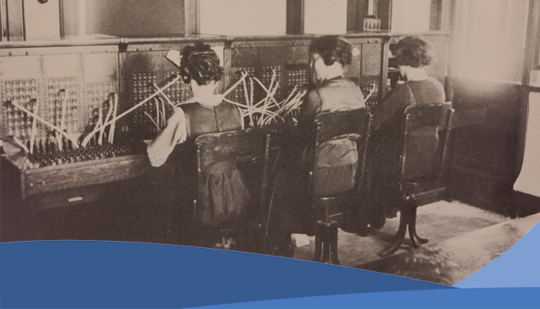 Photo of three women working Photo shows three women working at desking